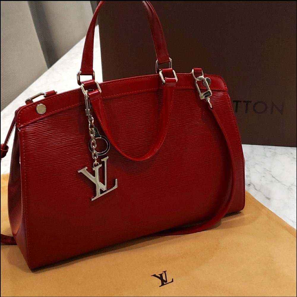 100% Authentic!! Red Louis Vuitton Epi Brea MM